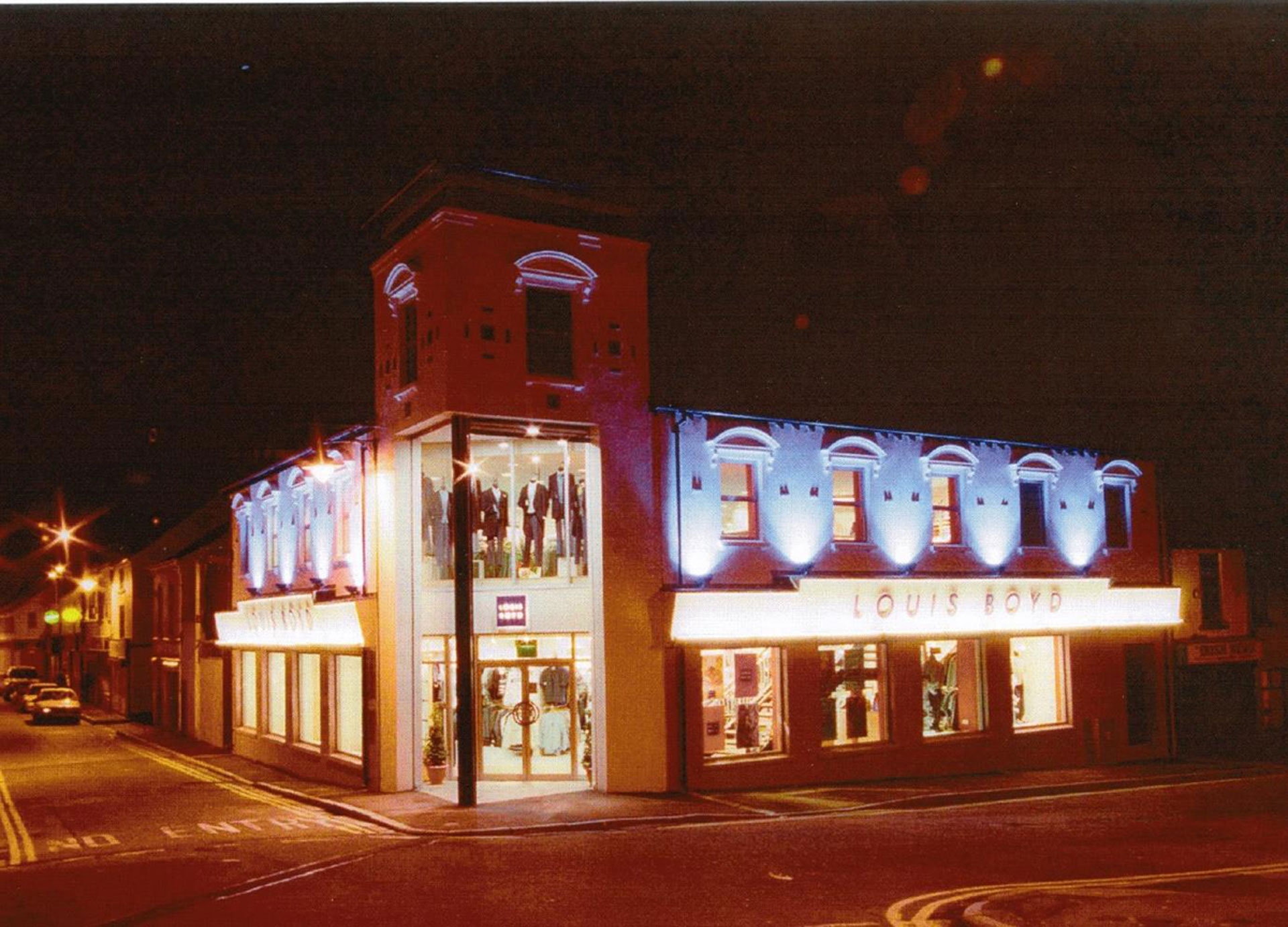 a 25 year old photograph of the Louis Boyd shop on the corner of two roads.